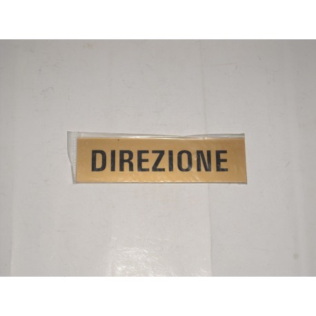 targa in plastica incisa oro adesiva "DIREZIONE" 150X40MM. T00735