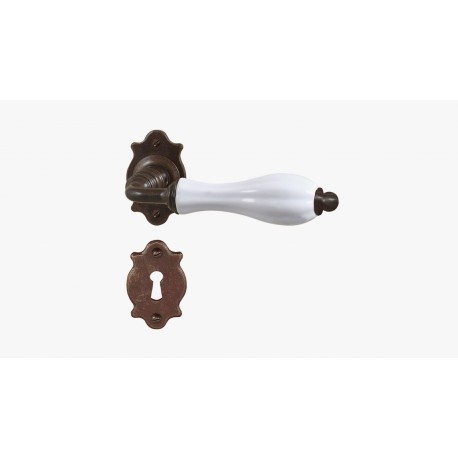 MANIGLIA FORGIATA SU ROSETTA + PORCELLANA RUGGINE FM383.N